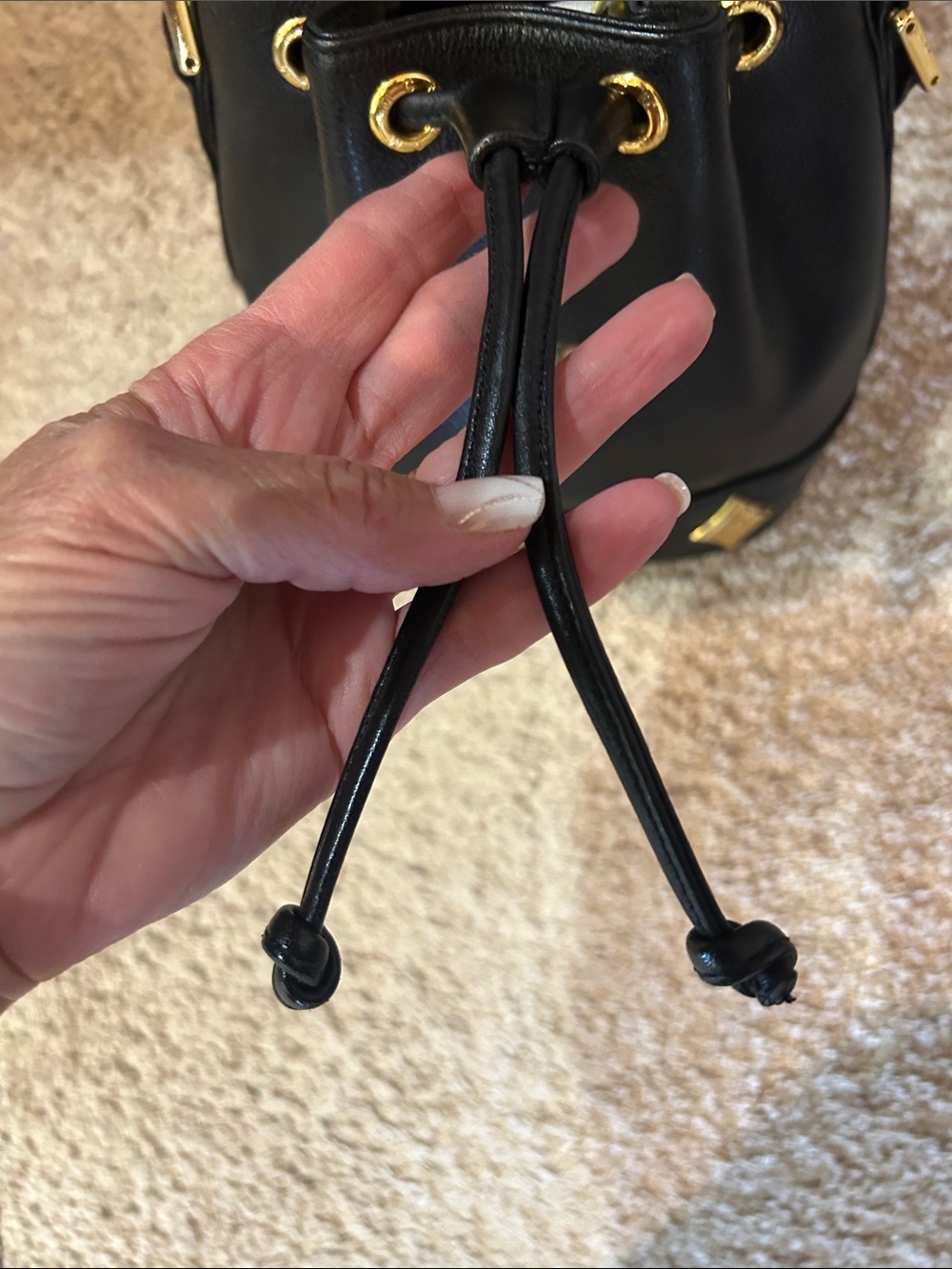 MCM Black Leather Mini Drawstring Bucket Bag with Gold Accents - Picture 11 of 14